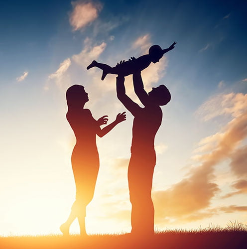 family in sun having fun