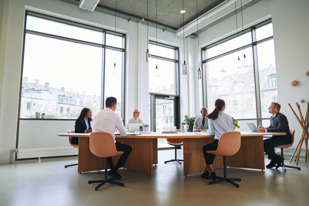 Meeting in a conference room of professionals to discuss the limitations of internal controls
